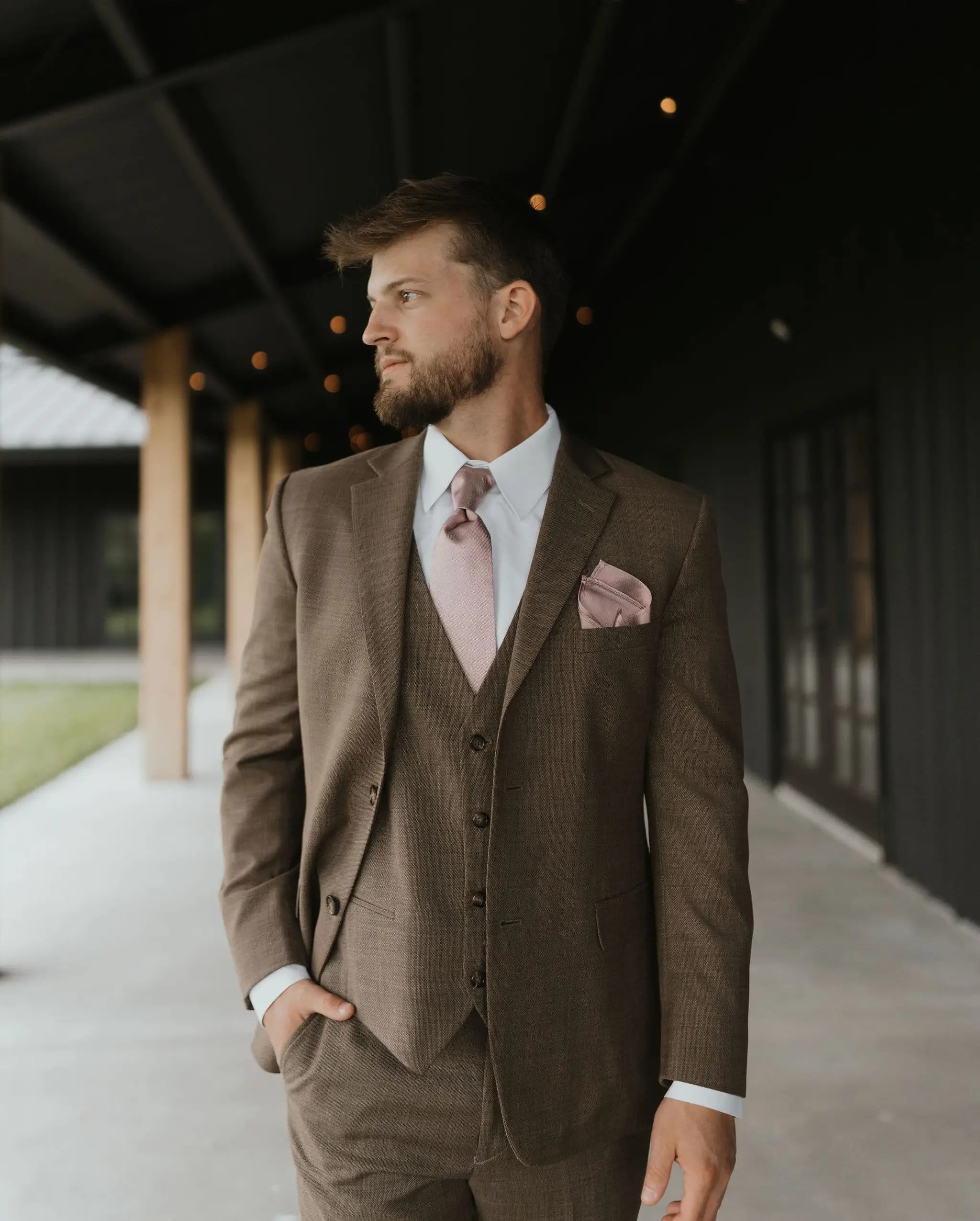 Model wearing a tuxedos dress